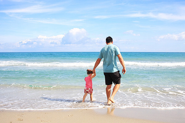 Family Portraits, father with daughter on beach