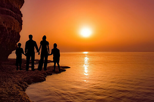 Some dramatic vacation photos are in silhouette, with a setting sun in the background. The contrast makes a vivid image.