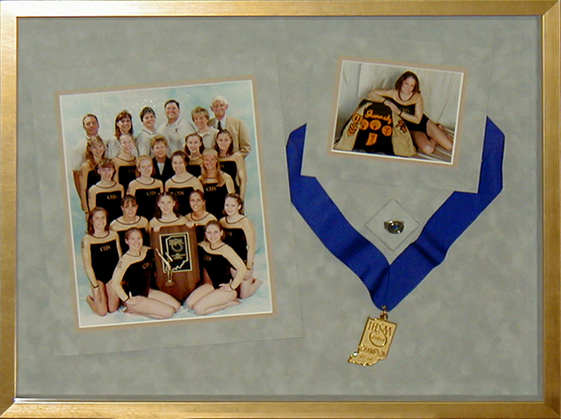 custom framing of dance team and medal