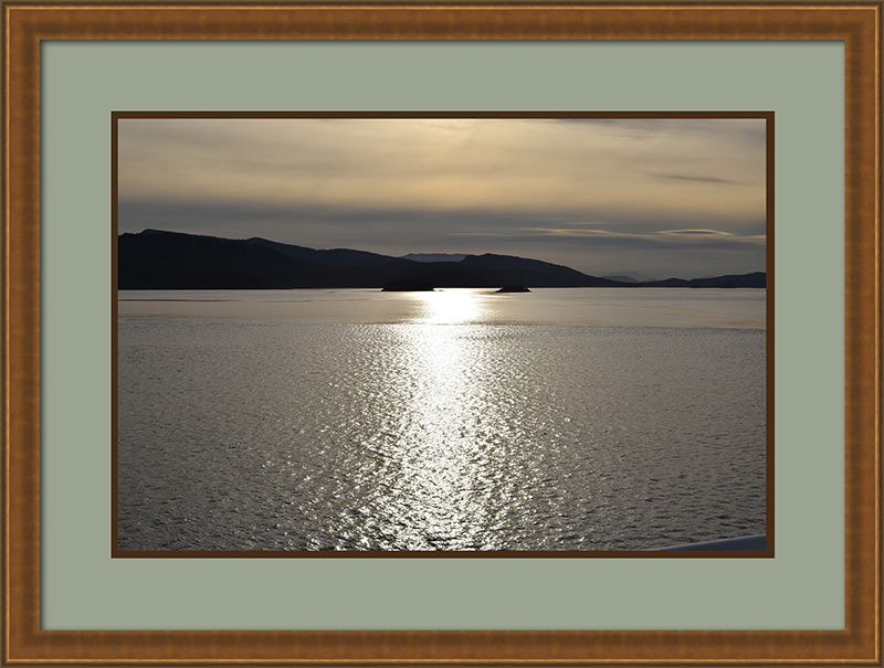 sunset photo in wood frame with mat, solving framing problems