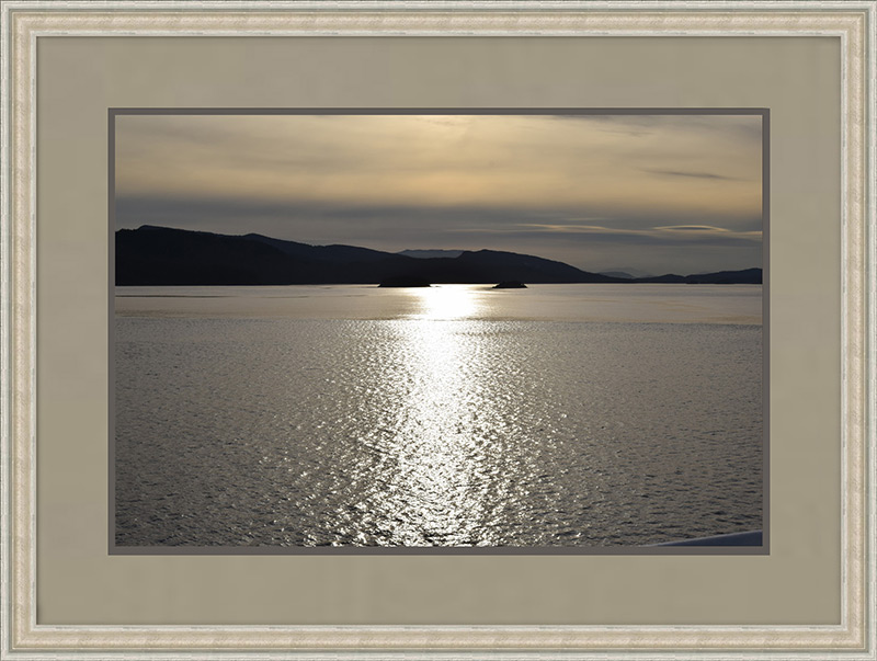 sunset photo in light frame with mat, solving framing problems