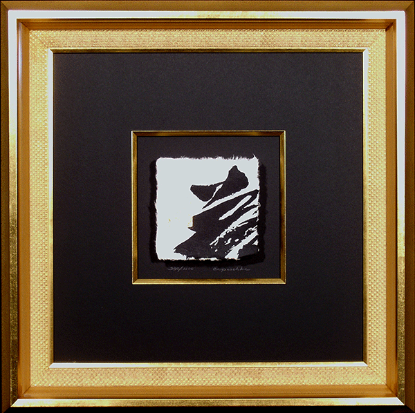 gold frames around abstract painting