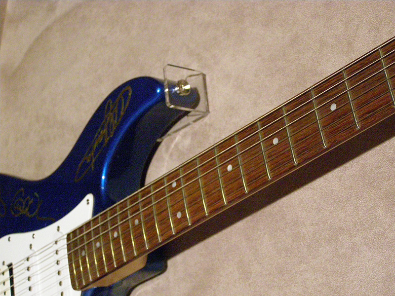 detail of a framed guitar